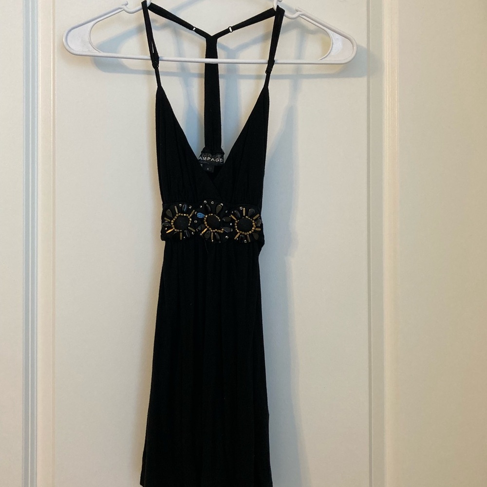 Elegant Black Top with Embellished Waist